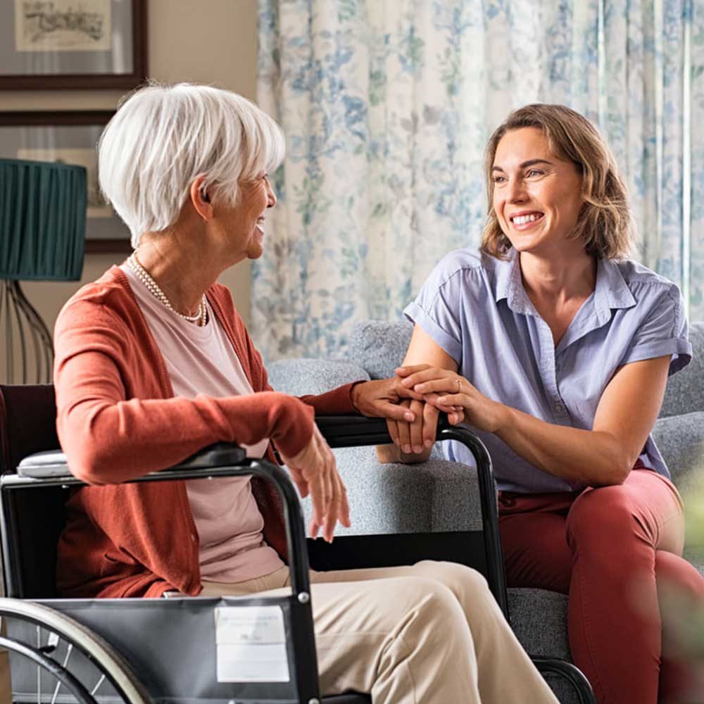 caregiver-helping-elderly-at-home